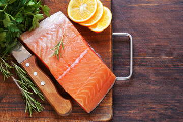 Wall Mural - fresh red fish fillet of salmon with lemon and herbs