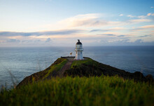 Panoramic View Of Historic White Lighthouse Landmark Perched On Oceanside Clifftop Cape Reinga Northland New Zealand