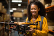 multiethnic woman holding a drone at a factory