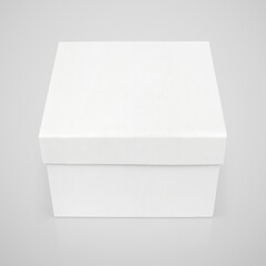 Poster - Closed square white paper box on gray with clipping path