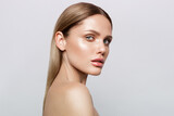 Fototapeta Panele - Beauty portrait of model with natural make-up. Fashion shiny highlighter on skin, sexy gloss lips make-up