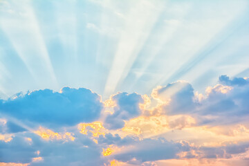 Wall Mural - Sunrise sky with sun rays breaking through the clouds