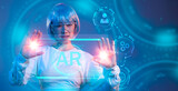 Fototapeta Miasto - Cyber punk girl short hair silver color wearing ar glasses virtual scren blue neon background. AR technology.