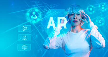 Fototapete - asian woman wearing vr glasses and experience ar. Future digital world technology AR augmented reality concept.