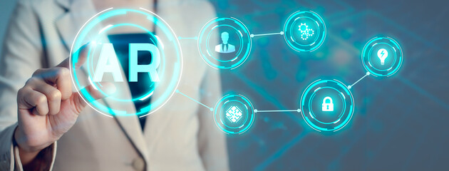 Fototapete - Businesswoman in cream suit connecting AR technology. Augmented reality blue icon. futuristic technology background.