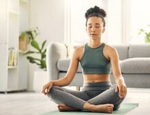 Meditation, Woman And Lotus Pose On Living Room Floor For Peace, Mental Health And Wellness At Home. Yoga, Breathing And Exercise By Female Meditating In A Lounge For Zen, Holistic Or Chakra Training