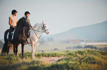 Wall Mural - Horse riding, freedom and view with friends in nature on horseback enjoying their hobby during a summer morning. Countryside, equestrian and female riders outdoor together for adventure or bonding