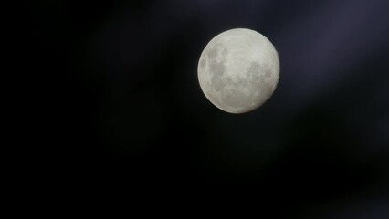 Wall Mural - Beautiful shot of a full moon bright in a night sky