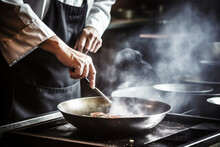 Chef Preparing Chinese Food In Wok Pan At The Restaurant, Close Up