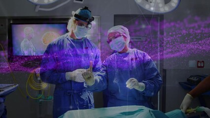 Poster - Animation of pink data network over diverse surgeons in disuccing in operating theatre