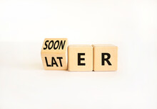 Sooner Or Later Symbol. Businessman Turns Wooden Cubes And Changes The Word Later To Sooner. Beautiful White Table White Background. Copy Space. Business And Sooner Or Later Concept.