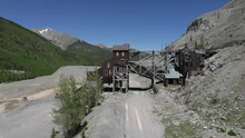 Abandoned Mining Mill Approaching Aerial View Monarch Colorado 4K Features An Aerial Drone View Approaching An Abandoned Mill Near A Steep Drop Off Near The Monarch Ski Area.