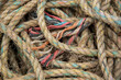 Pile of fishing rope and nylon netting. Close up view
