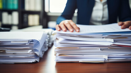 Businesswoman hands working in Stacks of paper files for searching information on work desk in office, business report papers. Created with Generative AI technology.