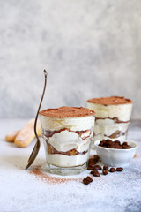 Wall Mural - Tiramisu - traditional italian coffee dessert from mascarpone cheese and biscuit in a glass cup.