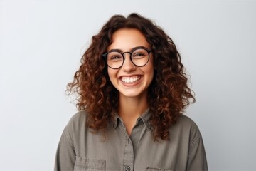 Poster - Portrait of beautiful young woman with curly hair and eyeglasses