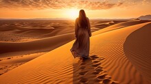Arabian Woman Walking In The Desert Dunes Of Egypt. Saharan Landscape. Travel To The Arid Sand Dunes At Sunset.	