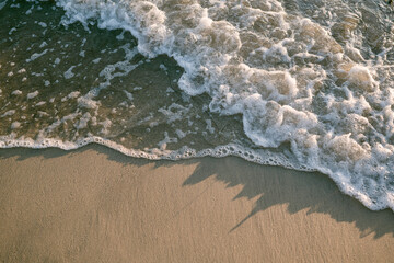 Close up shot of waves at the beach