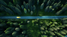 A Yellow Camper Van Drive On A Road Crossing Through Green Forest, Top View, Traveling Concept. Generative Ai