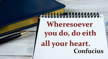 Wheresoever You Do, Do Eith All Your Heart. Confucius- Words In A Notebook On The Background Of A Weekly And A Pen.
