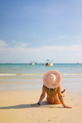 Wall Mural - Woman at the beach in Thailand