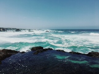 Poster - Stunning seascape featuring crystal clear waters on a bright, sunny day