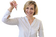 © ty - Cheerful middle aged female, real estate agent holding keys to new house on a transparent background.