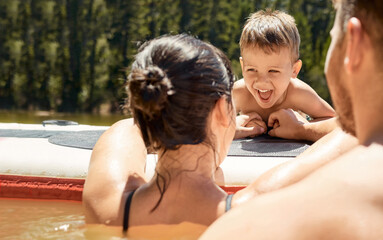 Poster - Happy, family with boat and in lake together with smile for bonding time. Summer vacation or holiday break, happiness or kayak and people in a river with canoe activity for adventure or wellness