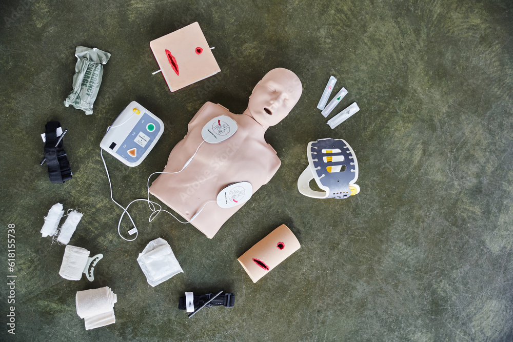 Medisol top view of CPR manikin, automated external defibrillator, wound care ...