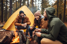 Cheerful Company Of Young People Drink Coffee In The Forest Camping. Photorealistic Illustration Of Generative AI.