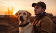 © Enigma - Happy young man holding dog Labrador in hands at sunset outdoors, generative AI