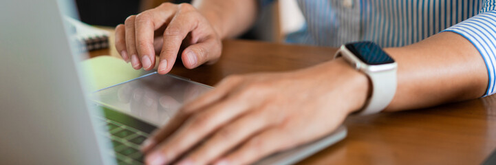 Fototapete - close up hands of businesswoman typing on laptop keyboard to working and searching business data
