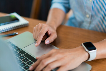 Fototapete - close up hands of businesswoman typing on laptop keyboard to working and searching business data