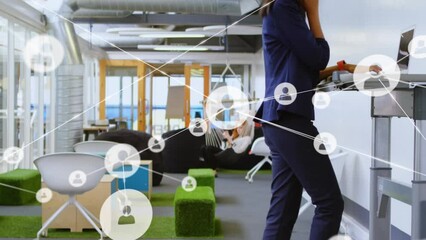 Poster - Animation of network of connections over biracial businesswoman using smartphone