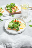 Fototapeta Kuchnia - Sandwich with cream cheese, shrimp, avocado and cucumber