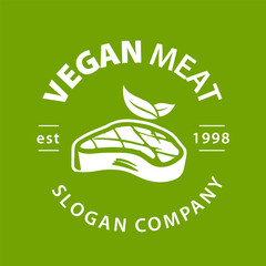 Wall Mural - Vegetarian meat Premium logo. Plant based meat logo. Vegan steak with leaf vector design. Vegan meat made from plants.