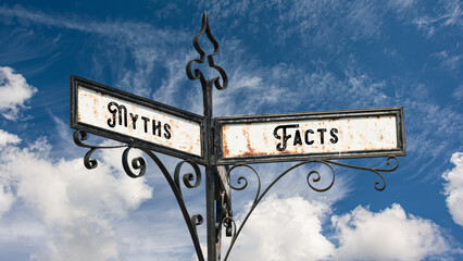 Wall Mural - Street Sign to Facts versus Myths