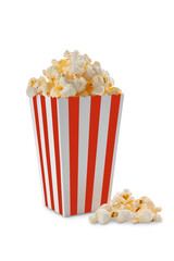 Red white striped carton bucket with tasty cheese popcorn, isolated on transparent background, PNG. Box with scattering of popcorn grains. Fast food, movies, cinema and entertainment concept.