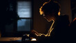 © Jeronimo Ramos - Young adult sitting at table, working late generated by AI