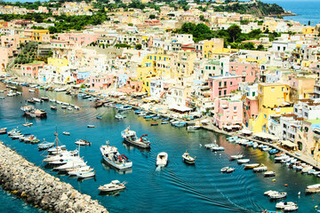 Wall Mural - Procida bellisima island in Italy with colorful houses tourist destination where to go in vacancy. Sea with boats and yachts where you can swim and have fun 