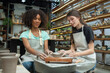 A beautiful fusion of cultures and creativity as Caucasian and African American girls work together, shaping clay into stunning hand-made art in the ceramic studio.