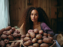 People Selling Potatoes In The Market