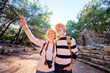 © luengo_ua - Travel and tourism. Senior family couple walking together on ancient sightseeing.