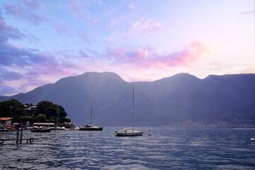 Wall Mural - Picturesque landscape with a  scenic view on the Lago di Como, big blue lake surrounded by green hill.