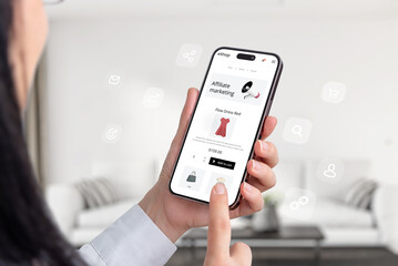 Wall Mural - Affiliate marketing composition with a mobile phone in a woman's hands and an ecommerce website offering affiliate marketing links for promotion