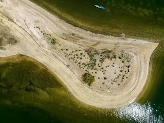 Canvas Print - Aerial view over a large sandbar in the green waters of Oyster Bay in Lloyd Harbor on Long Island