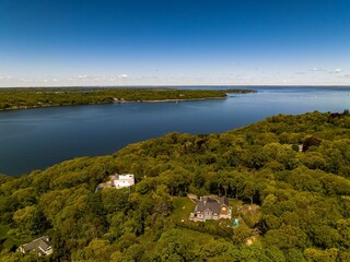 Canvas Print - Aerial view over the calm waters in Oyster Bay near Lloyd Harbor, New York on a sunny day