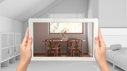Wall Mural - augmented reality concept. hand holding tablet with ar application used to simulate furniture and de