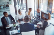 © Thurstan Hinrichsen/peopleimages.com - Meeting, corporate and planning with business people in office for strategy, report and teamwork. Support, collaboration and project management with employees in boardroom for workshop and solution
