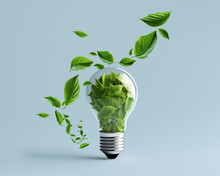 Flying Green Leaves Around The Lightbulb Filled With Leaves. Renewable Green Energy Concept.